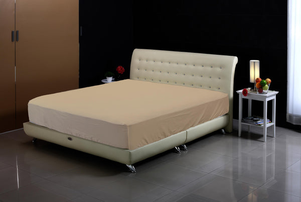 topper cover on bed gold