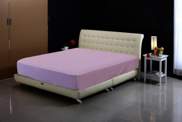 topper cover on bed lavender